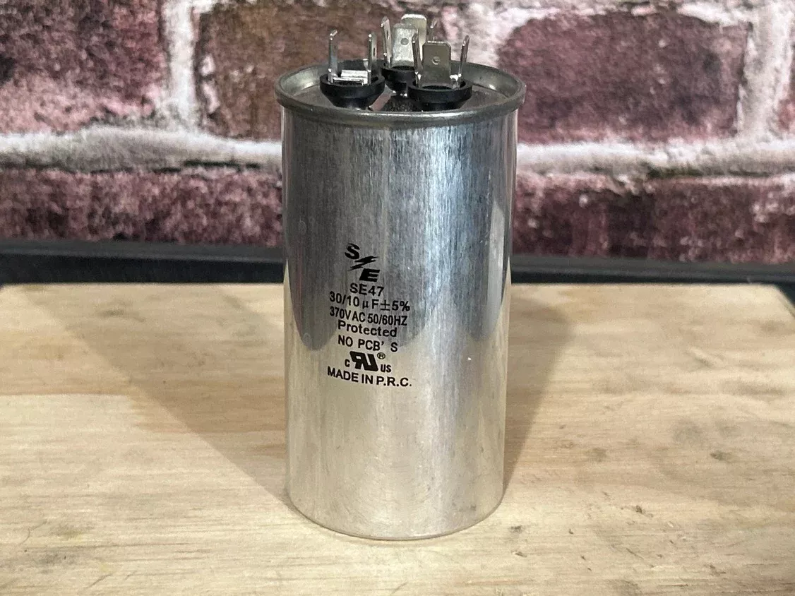 370 Vac, 30+10MFD 50/60 Hz, Round Capacitor