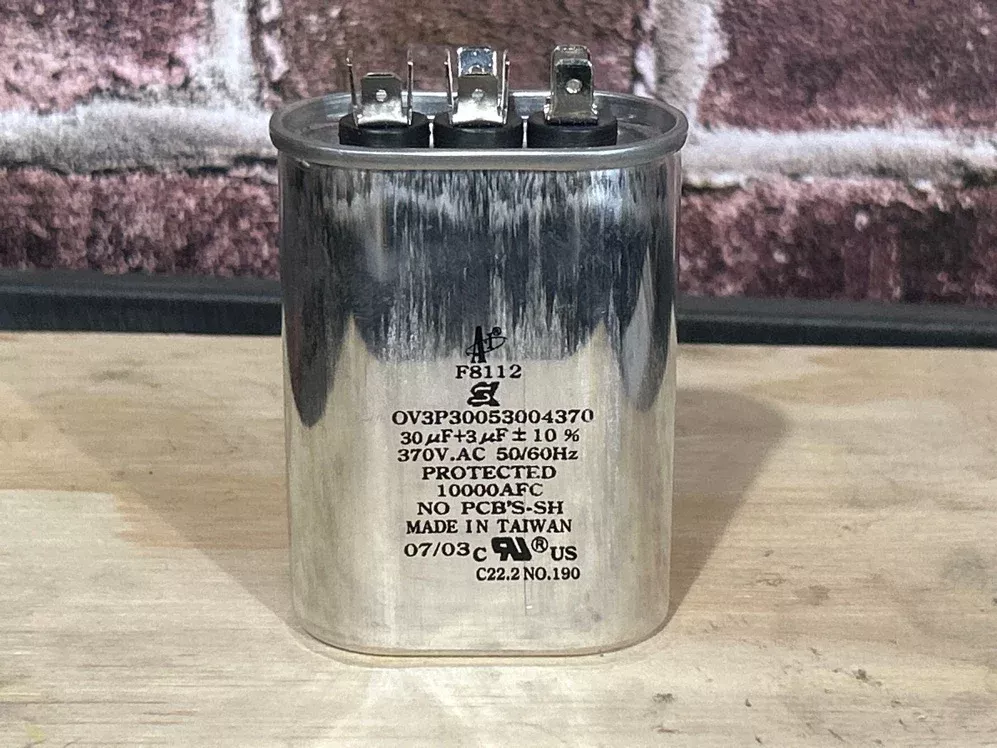 370 Vac, 30+3MFD 50/60 Hz, Round Capacitor
